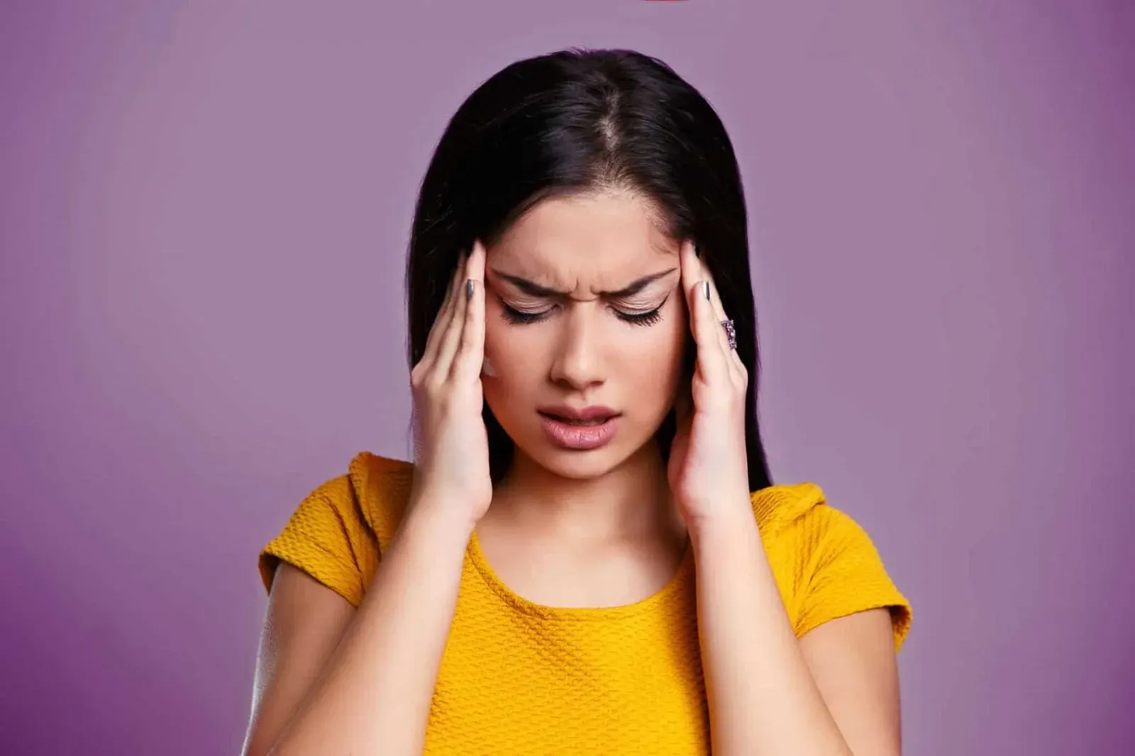 Botox-for-migraines-does-it-work - Woman nursing migraine